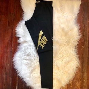 nike gold logo leggings
